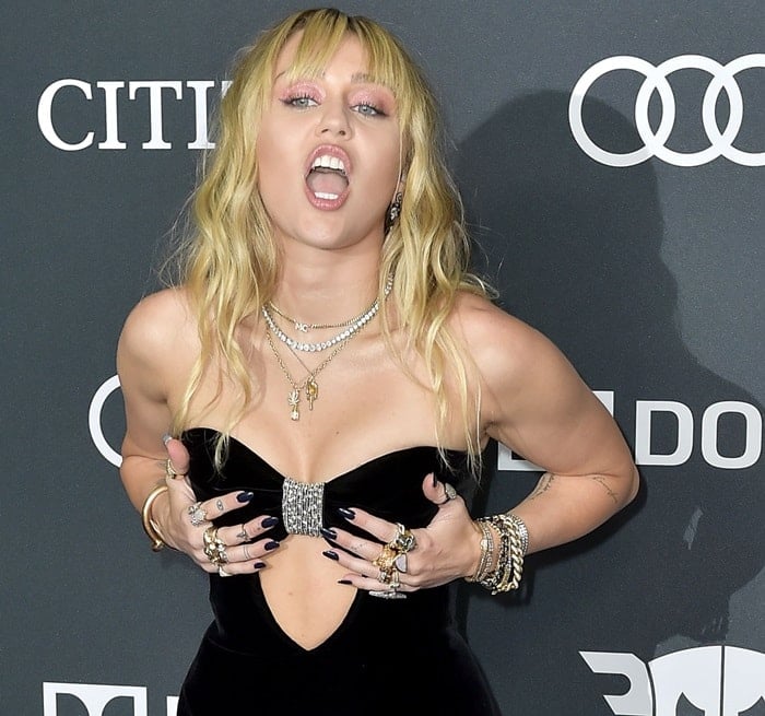 Miley Cyrus flaunted her cleavage in a custom dress from Saint Laurent by Anthony Vaccarello