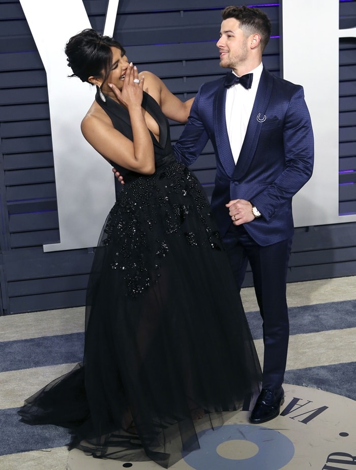 Nick Jonas cozied up to wife Priyanka Chopra at the 2019 Vanity Fair Oscar Party at the Wallis Annenberg Center for the Performing Arts in Beverly Hills, California, on February 24, 2019