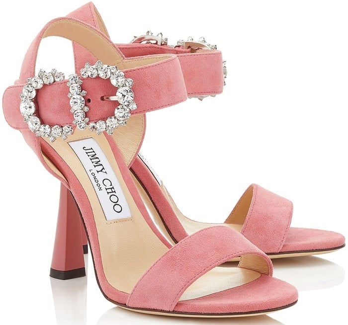 These sandals are crafted from suede and feature a peep toe, a leather sole, a high heel, an ankle strap with a side buckle fastening and a beautifully orate crystal buckle
