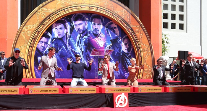 Kevin Feige, Chris Hemsworth, Chris Evans, Robert Downey Jr., Scarlett Johansson, Mark Ruffalo, and Jeremy Renner at their handprint ceremony at the TCL Chinese Theater in Hollywood on April 23, 2019