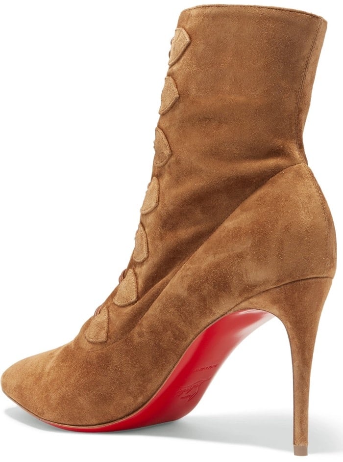 The frogging down the front of Christian Louboutin's ankle boots is inspired by traditional French military uniforms