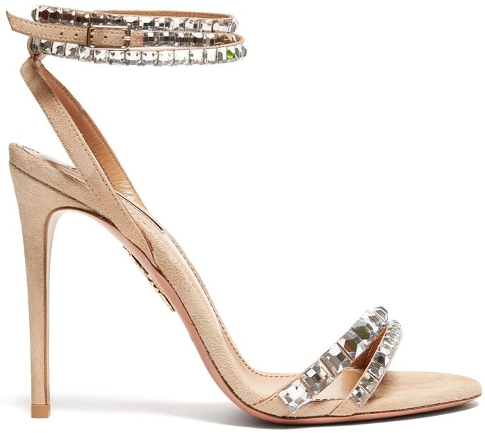 Imbued with timeless elegance for after-dark dressing, these nude sandals are accented with sparkling crystals on the straps and lined in smooth tan leather