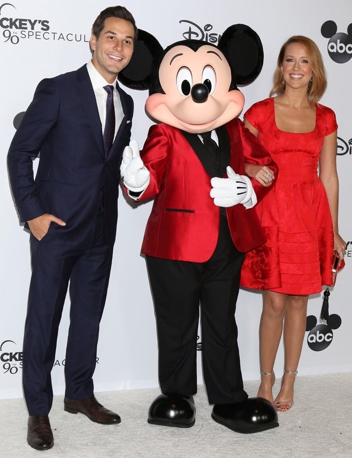 Anna Camp and Skylar Astin attending Mickey’s 90th Spectacular celebration