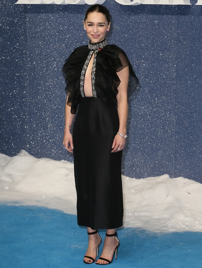 Emilia Clarke wearing Prada for the UK premiere of Last Christmas