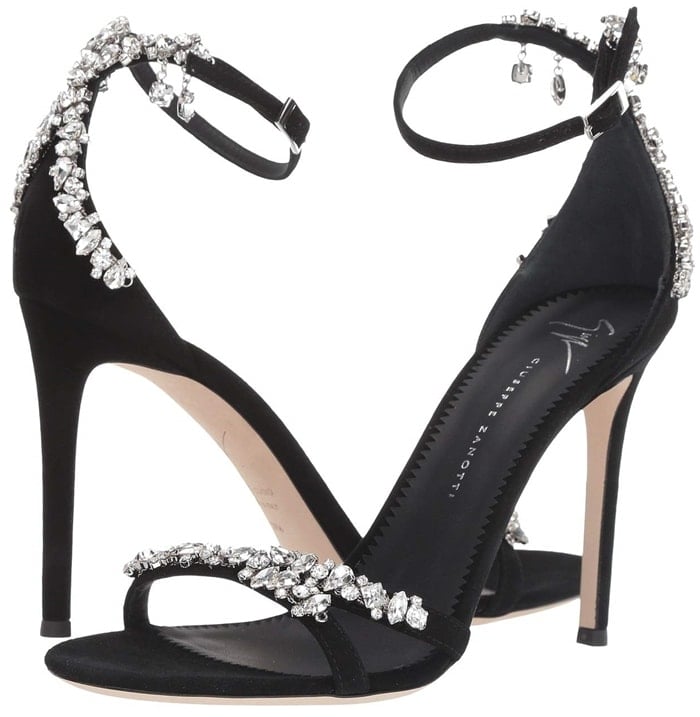 Black suede Lynette sandals fasten with an ankle strap and are adorned with sparkling rhinestones