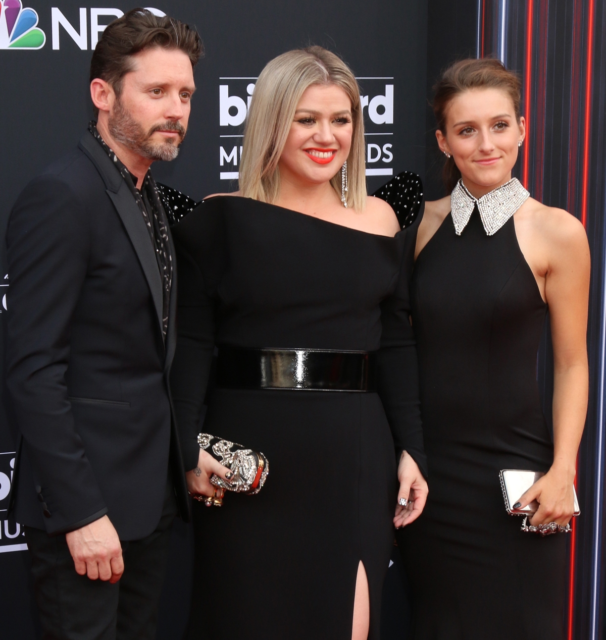 Host Kelly Clarkson (C), Brandon Blackstock, and Savannah Blackstock attend the 2018 Billboard Music Awards