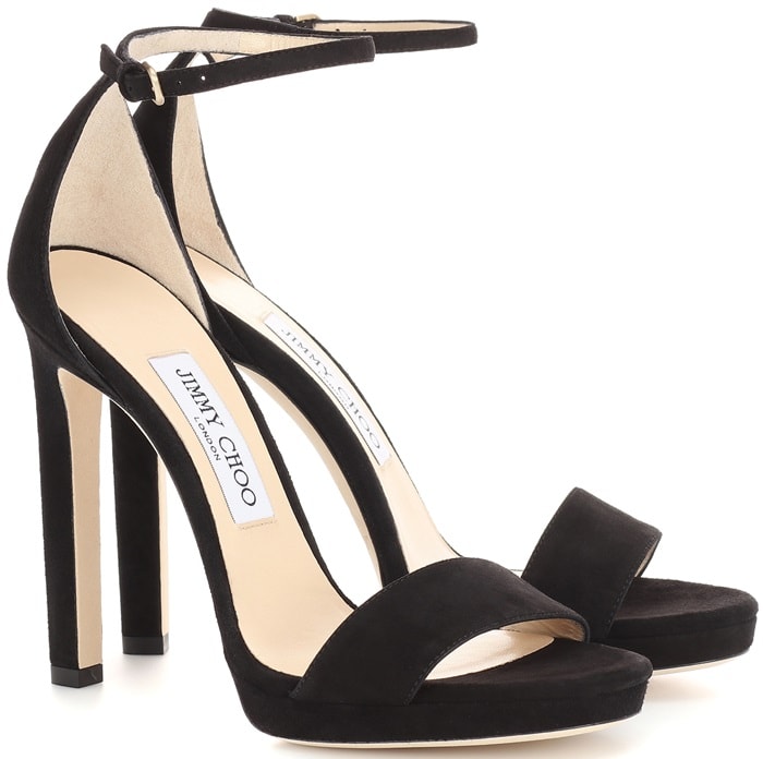 A slim platform and lofty stiletto heel add leg-lengthening lift to a minimalist Italian sandal