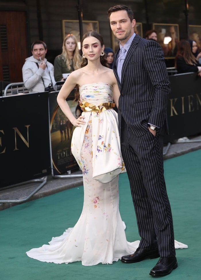 Lily Collins and Nicholas Hoult at the UK premiere of their new movie Tolkien at the Curzon Mayfair in London, England, on April 29, 2019