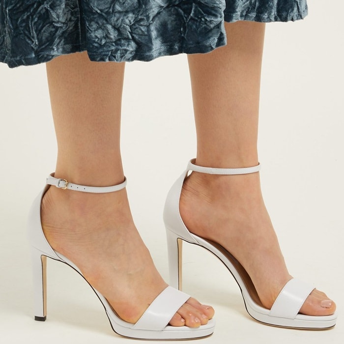 These white leather Misty sandals are a classic Jimmy Choo style, with a minimal ankle strap and perfectly placed single front strap offering a polished finish to warm-weather looks