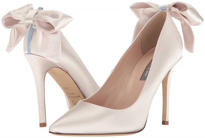 Classic pumps with a large bow and grosgrain trim at the heel