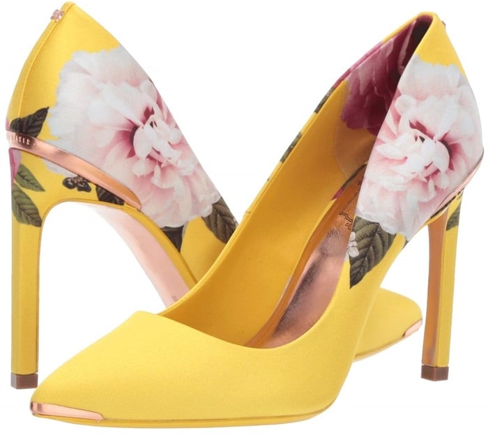 The classic pump gets a scene-stealing update in floral-printed satin, while signature rose-goldtone details spotlight the pointy toe and stiletto heel