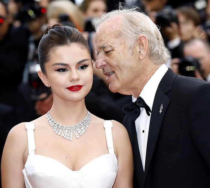 Bill Murray whispering in Selena Gomez's ear