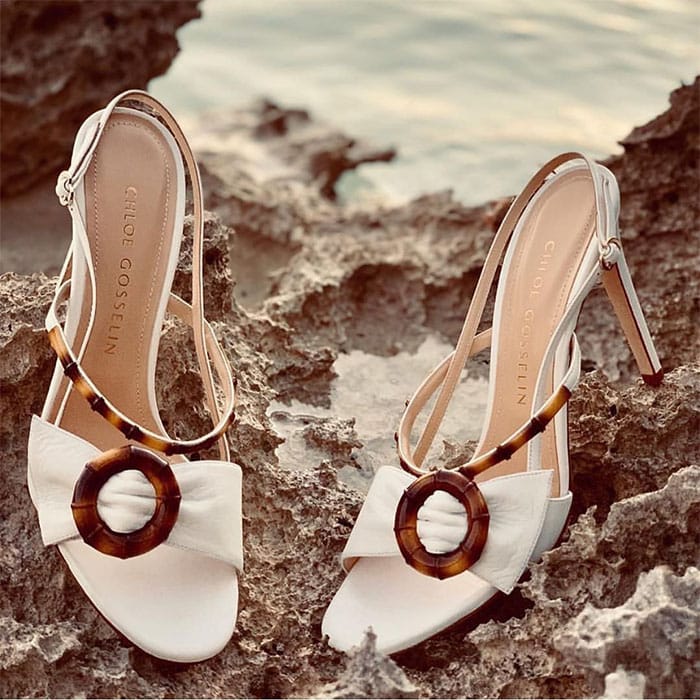 Chloe Gosselin's Instagram post of their shoe of the day: the 'Celeste' sandals in white nappa with handpainted bamboo buckles and cuffs — was shared on May 30, 2019
