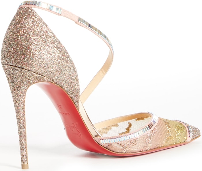 Baguette crystals wind around a sultry pointy-toe pump, highlighting the mix of materials and the curvy cross-strap of this event-ready stiletto