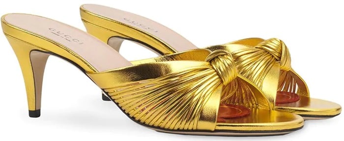 A vibrant re-imagination of a classic model, these gold-tone leather knot detail metallic sandals feature a branded insole, an open toe, a tapered mid-heel and a knotted detail to the front