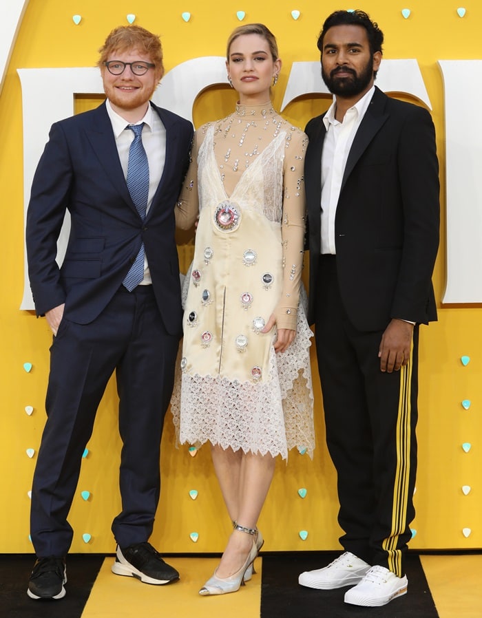 Lily James styled her leg-lengthening silver Burberry pumps with a sheer embellished dress at the Yesterday premiere, standing out between casually dressed co-stars Ed Sheeran and Himesh Patel