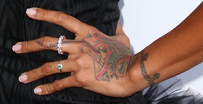 Karrueche Tran's enormous hand tattoo of a Chinese dragon