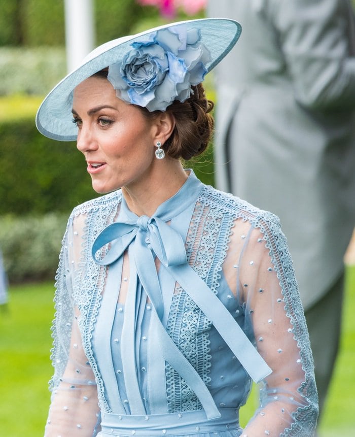 Catherine, Duchess of Cambridge styled her blue Elie Saab dress with a matching Philip Treacy hat