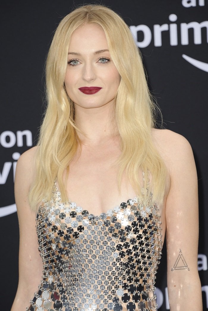 Sophie Turner had an infinite triangle tattooed on her upper left arm in July 2018