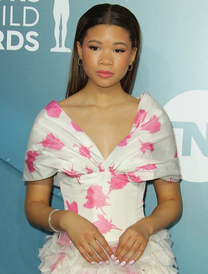 Storm Reid looked stunning in a white and pink dress by Giambattista Valli