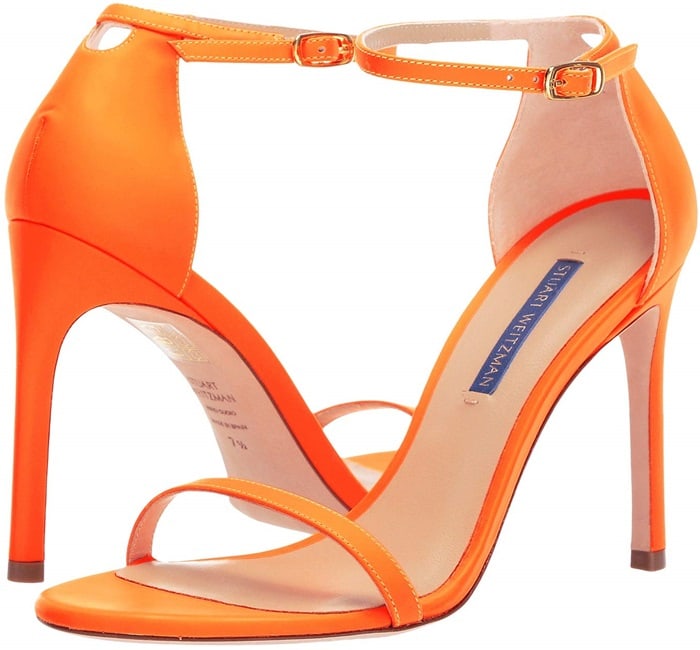 Designed to lengthen legs and turn heads, these neon sandals are crafted with a single strap across the toe and the ankle