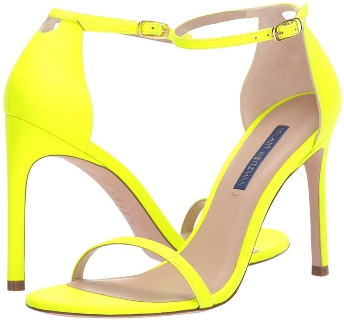 Designed to lengthen legs and turn heads, these neon sandals are crafted with a single strap across the toe and the ankle