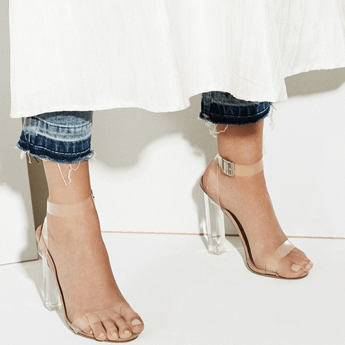 A transparent heel and straps add plenty of modern flair to a lofty, cleanly styled Kiki sandal