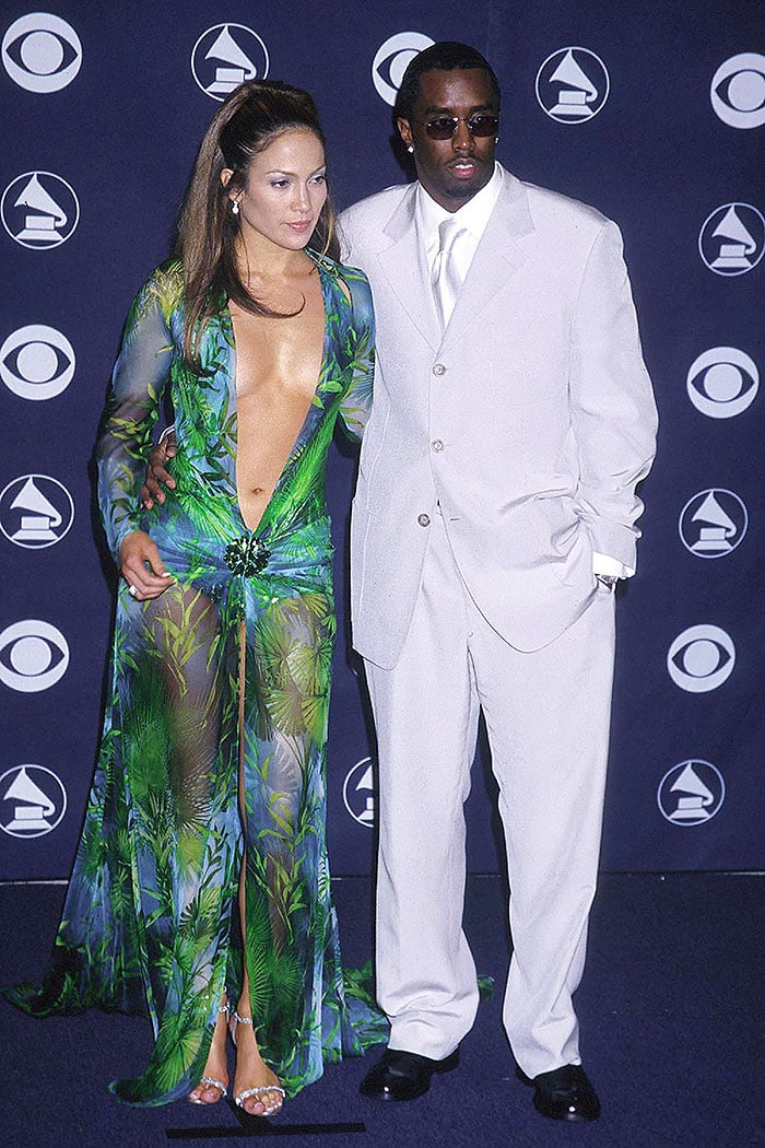 Jennifer Lopez wearing the iconic green Versace dress as she posed next to then-boyfriend Sean “Diddy” Combs at the 2000 Grammy Awards