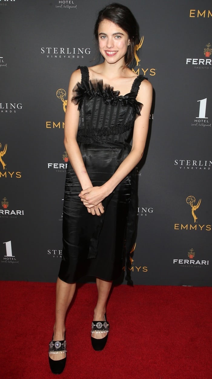 Margaret Qualley gave off classic Hollywood glamour vibes in a sleeveless black dress complemented by a pair of bedazzled shoes at the 2019 Casting Directors Nominee Reception