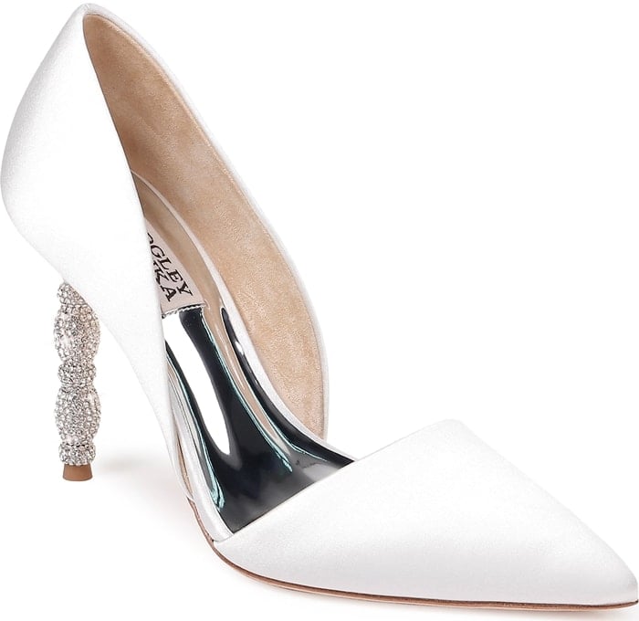 A sculptural heel featuring stacked geometric forms set with tiny pavé crystals simply dazzles on a white pointy-toe pump with a sophisticated d'Orsay silhouette