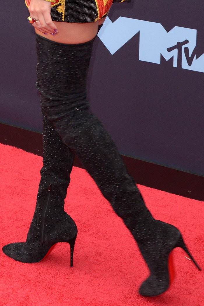 Taylor Swift's legs in Christian Louboutin 'Elouix' stretch thigh-high boots studded with black crystals