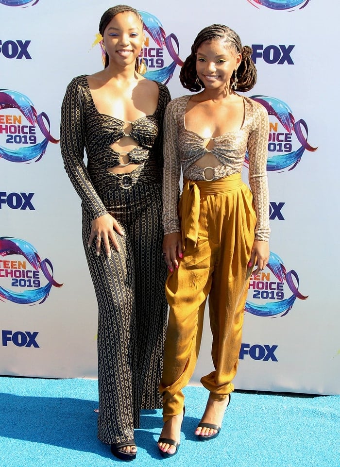 Chloe x Halle walk the blue carpet at the 2019 Teen Choice Awards