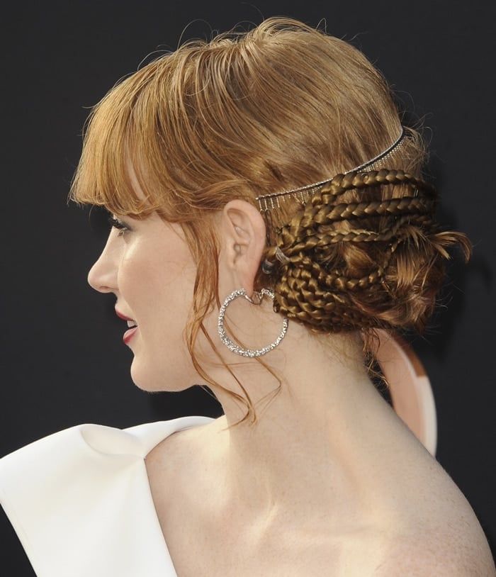 Jessica Chastain's red hair was styled by Los Angeles-based hairstylist Renato Campora