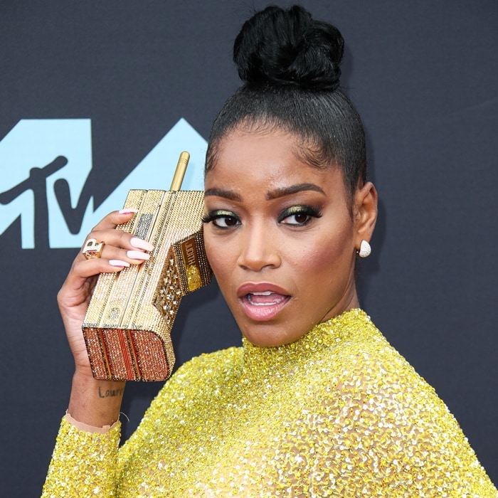 Actress Keke Palmer was disappointed when realizing she can't call anyone with her retro cellphone clutch bag