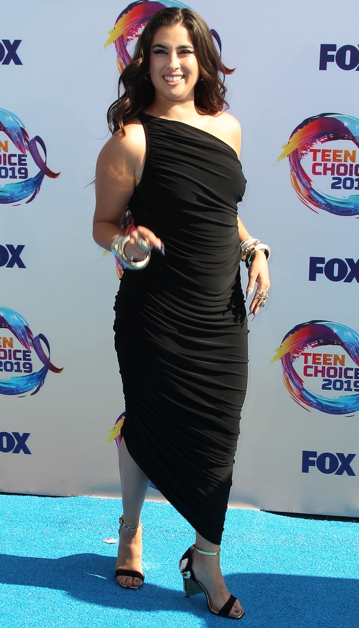 Lauren Jauregui strikes a pose in a black dress as she arrives at the 2019 Teen Choice Awards