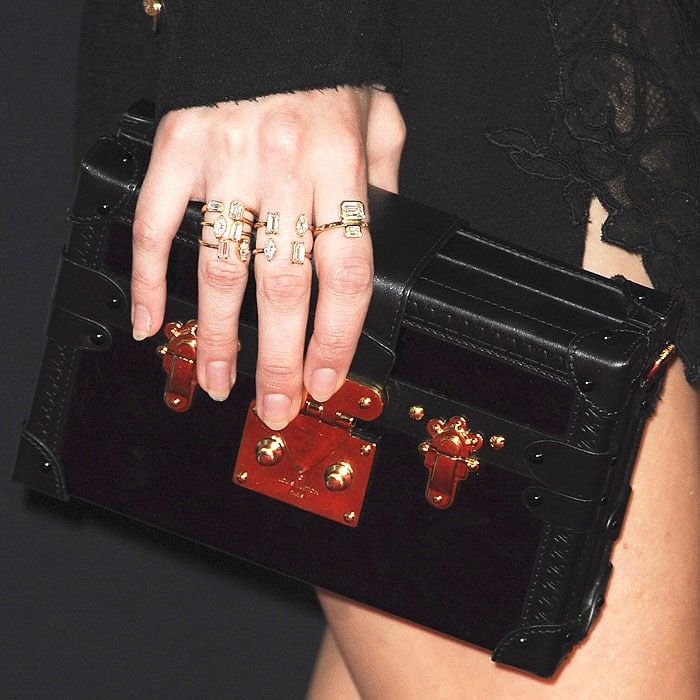 Details of Samara Weaving's Louis Vuitton clutch and conflict-free Diamond Foundry rings