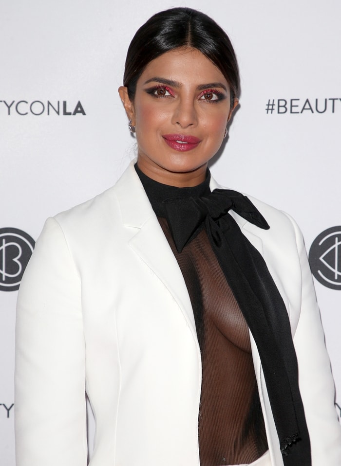 Priyanka Chopra's see-through shirt and bright pink and black eye makeup