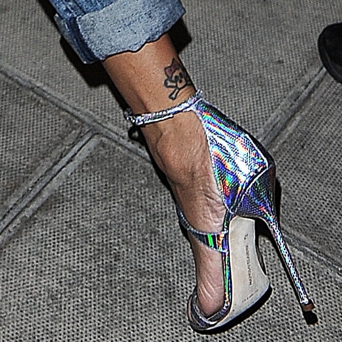 Rihanna's feminine skull tattoo on her left ankle