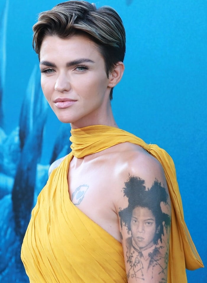 Ruby Rose has a gigantic tattoo of graffiti artist Jean-Michel Basquiat on her upper left arm