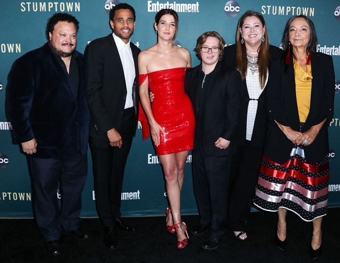 The cast of Stumptown: Adrian Martinez, Michael Ealy, Cobie Smulders, Cole Sibus, Camryn Manheim and Tantoo Cardinal