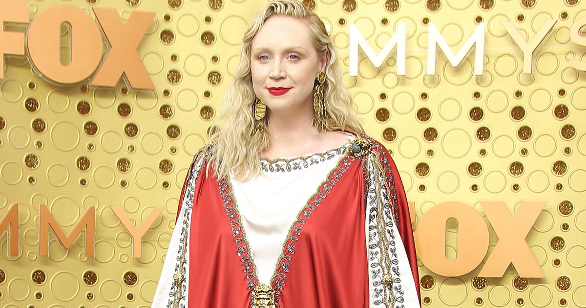 Divine Gwendoline Christie in Gucci Jesus Dress and Gold Sandals