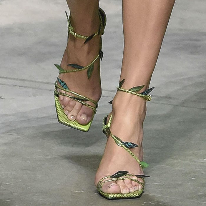 Jennifer Lopez's feet in strappy, leafy green-snake sandals