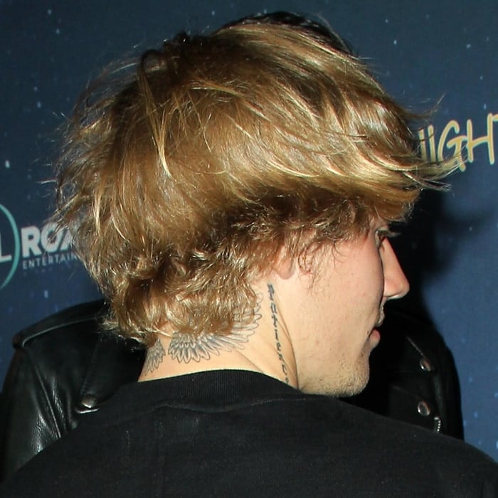 Justin Bieber's neck tattoo of guardian angel wings is a beautiful and meaningful reminder of his faith