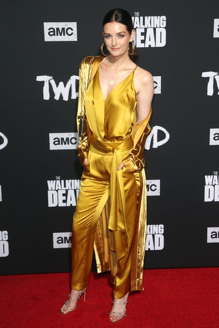 Lydia Hearst in a Michelle Mason mustard-satin outfit and Sophia Webster Rosalind Gem sandals