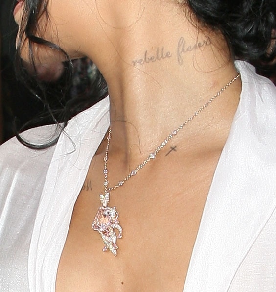 Rihanna shows off her rebelle fleur neck tattoo