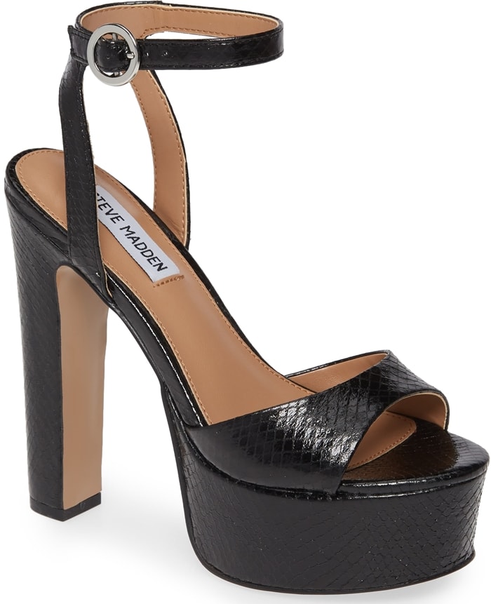 A lofty platform amplifies the retro appeal of this standout black ankle-strap sandal