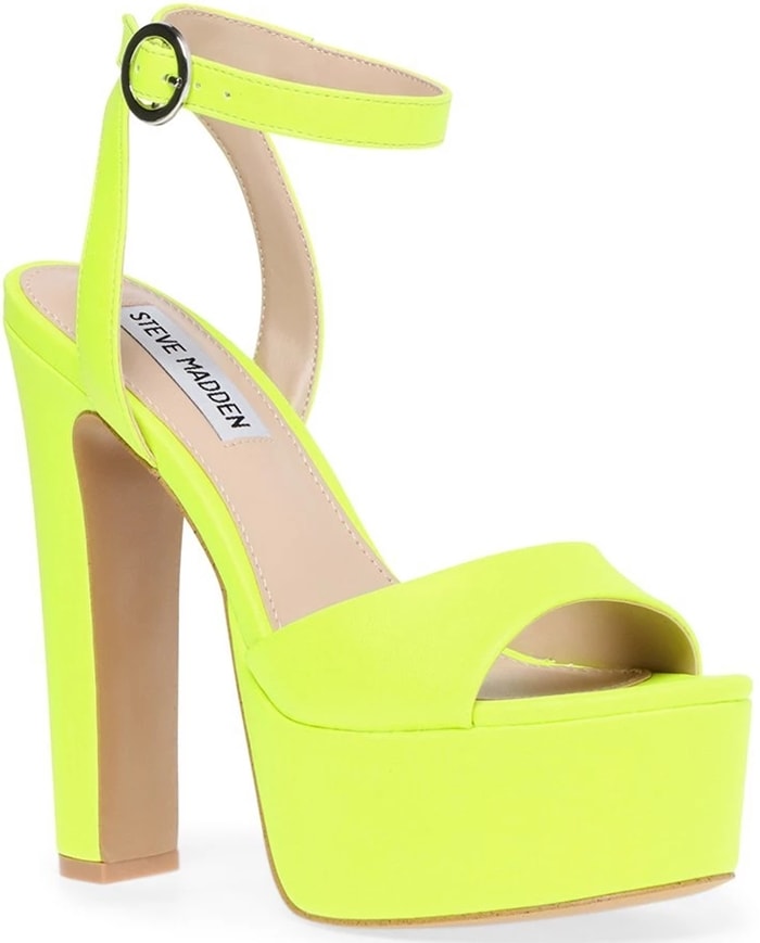 A lofty platform amplifies the retro appeal of this standout neon yellow ankle-strap sandal
