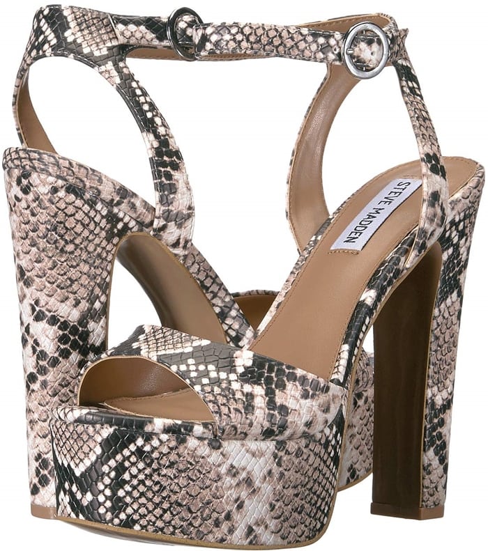 A lofty platform amplifies the retro appeal of this standout snake ankle-strap sandal