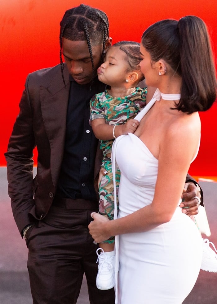 Stormi Webster, Travis Scott, and Kylie Jenner at the premiere of Look Mom I Can Fly