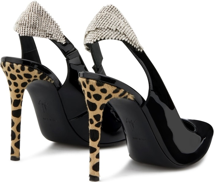 These high-heel, black patent leather slingback sandals are characterized by a crystal accessory in the back strap, and by the covered heel in natural, animal-print pony
